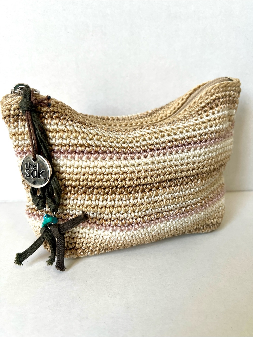 The Sak Beige and Cream Crocheted Cosmetic Pouch with Charm